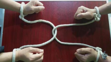不能解开绳结, 如何才能把两个人的手分开? 你能做到算你厉害