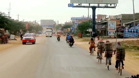 中国小伙坐车去柬埔寨首都，实拍当地的主干道，建设怎么样？